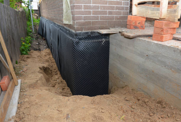 Happy homeowners after waterproofing job in Garrett Park